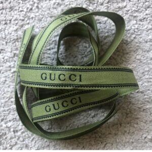Authentic Gucci Ribbon Green with black Gucci logo. 161 cm.